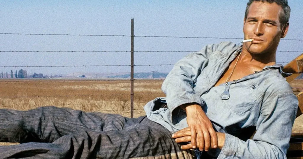 Paul Newman as Cool Hand Luke showing defiance in prison chain gang
